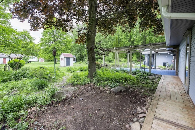 37207 27 Mile Rd, Roads, Lenox, MI 48048 - view of yard featuring a pergola and a deck