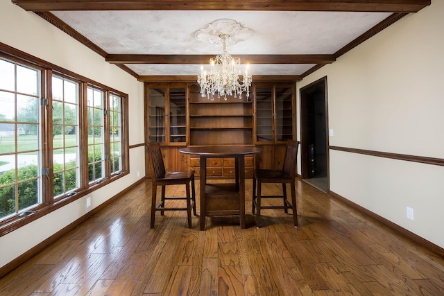 37207 27 Mile Rd, Roads, Lenox, MI 48048 - dining room with baseboards, a chandelier, beam ceiling, dark wood finished floors, and ornamental molding