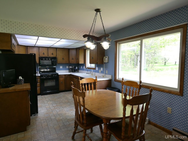 26514 Hendrickson Rd, Calumet, MI 49913 - dining space with wallpapered walls