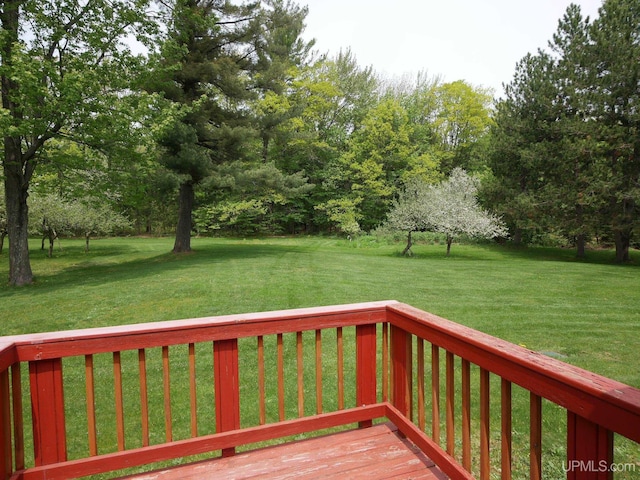 26514 Hendrickson Rd, Calumet, MI 49913 - wooden terrace featuring a lawn