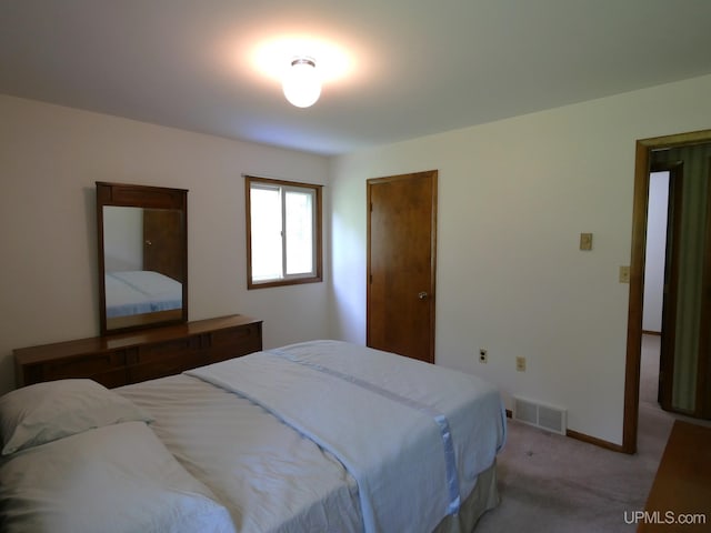 26514 Hendrickson Rd, Calumet, MI 49913 - bedroom featuring light colored carpet