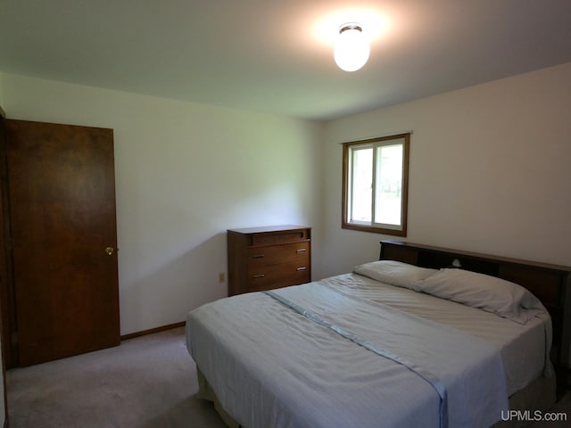 26514 Hendrickson Rd, Calumet, MI 49913 - bedroom featuring light colored carpet and baseboards