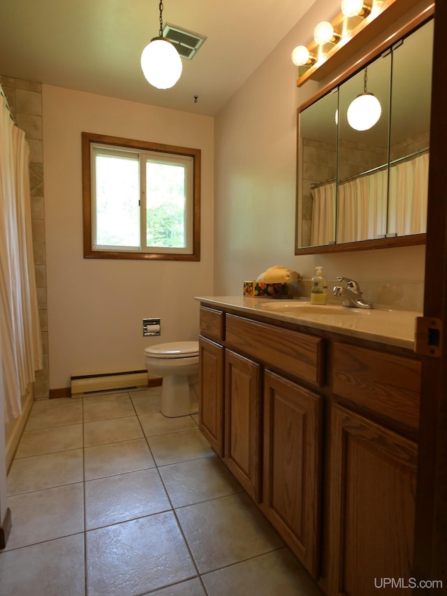 26514 Hendrickson Rd, Calumet, MI 49913 - full bathroom featuring baseboard heating, vanity, tile patterned floors, toilet, and a shower with curtain
