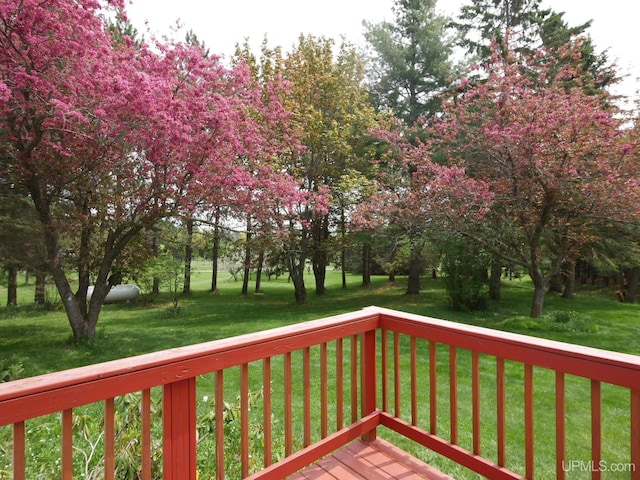 26514 Hendrickson Rd, Calumet, MI 49913 - deck with a lawn