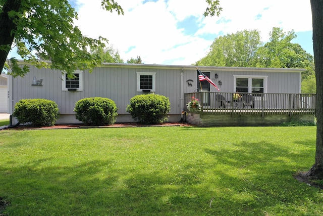 237 S Allen Rd, Saint Clair, MI 48079 - view of front facade with a front yard, a deck, and a garage