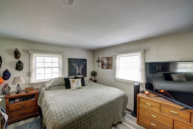 237 S Allen Rd, Saint Clair, MI 48079 - bedroom featuring multiple windows, light wood-style flooring, ornamental molding, and baseboards