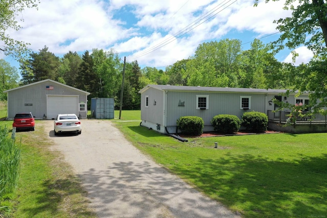 237 S Allen Rd, Saint Clair, MI 48079 - view of front facade with a garage, a front lawn, and driveway