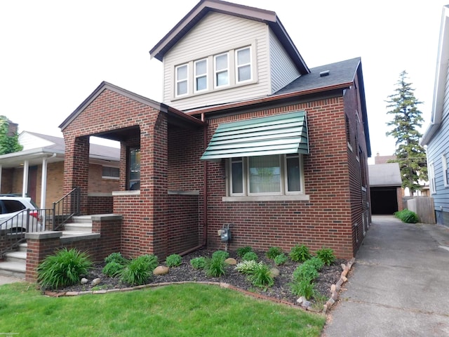 1364 Beaconsfield Ave, Grosse Pointe Park, MI 48230 - view of front of property featuring brick siding and covered porch