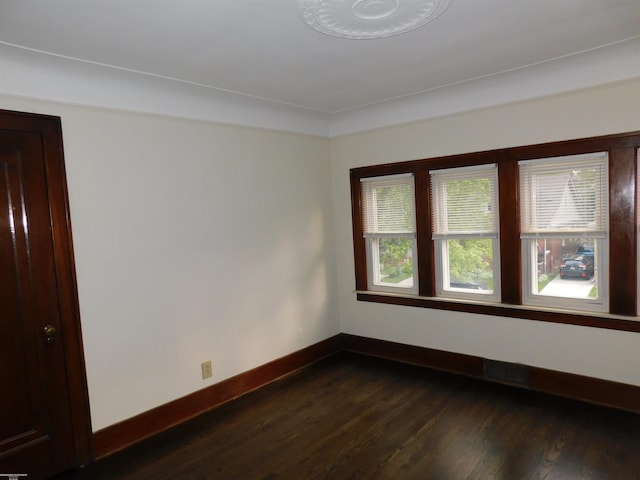 1364 Beaconsfield Ave, Grosse Pointe Park, MI 48230 - empty room with baseboards and dark wood finished floors