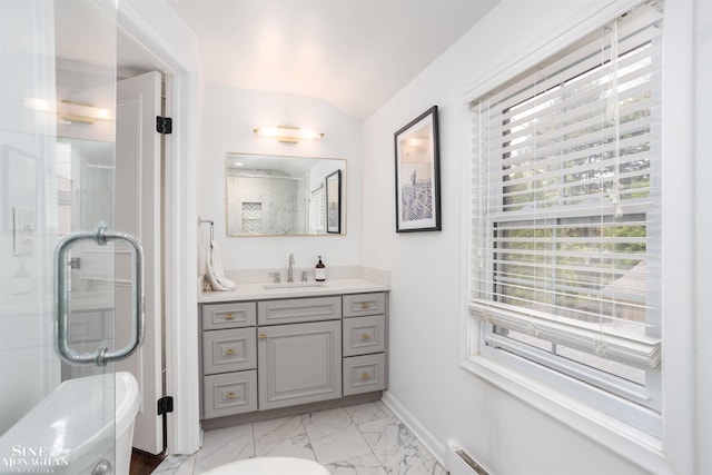 766 Lakeland St, Grosse Pointe, MI 48230 - full bathroom featuring marble look tiles, vanity, a stall shower, baseboards, and vaulted ceiling