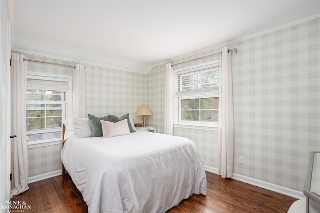 766 Lakeland St, Grosse Pointe, MI 48230 - bedroom featuring crown molding, wallpapered walls, dark wood-style flooring, and baseboards