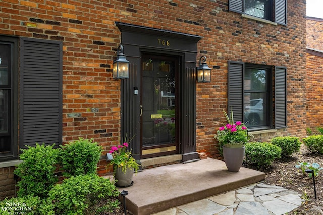 766 Lakeland St, Grosse Pointe, MI 48230 - doorway to property featuring brick siding