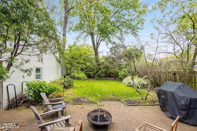 766 Lakeland St, Grosse Pointe, MI 48230 - view of green lawn with a patio and a fire pit