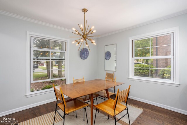 766 Lakeland St, Grosse Pointe, MI 48230 - dining space with crown molding, a chandelier, baseboards, and wood finished floors