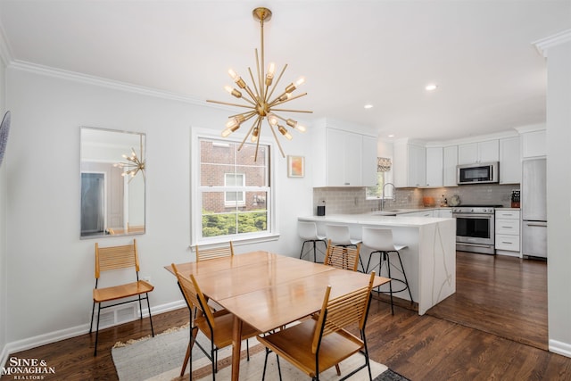 766 Lakeland St, Grosse Pointe, MI 48230 - dining room featuring a chandelier, ornamental molding, dark wood-style flooring, baseboards, and recessed lighting