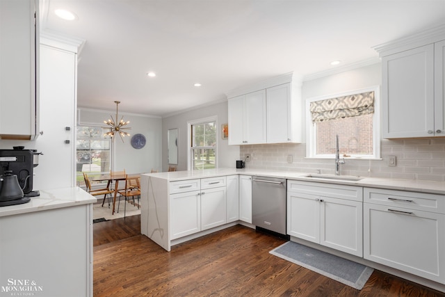 766 Lakeland St, Grosse Pointe, MI 48230 - kitchen featuring stainless steel dishwasher, a sink, ornamental molding, a peninsula, and backsplash
