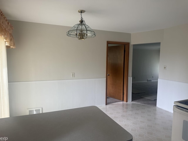 26167 Fairfield Ave, Warren, MI 48089 - spare room with a wainscoted wall