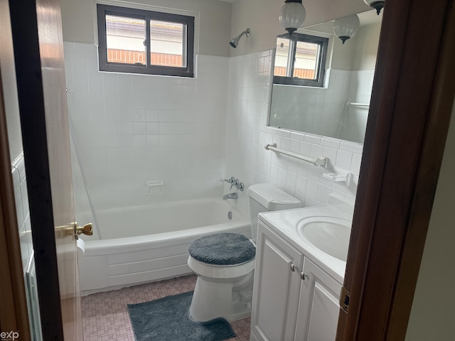 26167 Fairfield Ave, Warren, MI 48089 - full bathroom with tile walls, tub / shower combination, toilet, vanity, and tile patterned floors