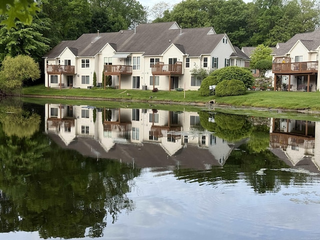119 Pondview Ct, Brighton, MI 48116 - aerial perspective of suburban area with a nearby body of water
