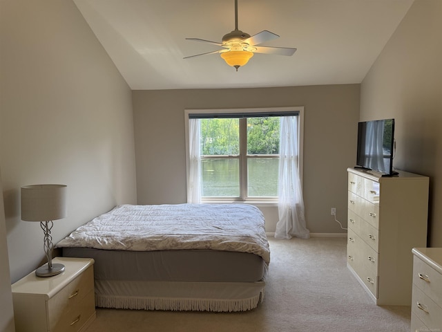 119 Pondview Ct, Brighton, MI 48116 - bedroom featuring light carpet, ceiling fan, baseboards, and vaulted ceiling