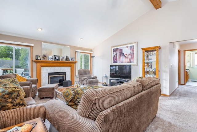 518 Lexington Dr, Rochester Hills, MI 48307 - living area with light colored carpet, a tile fireplace, beam ceiling, high vaulted ceiling, and baseboards