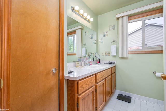518 Lexington Dr, Rochester Hills, MI 48307 - bathroom featuring vanity, tile patterned flooring, and baseboards