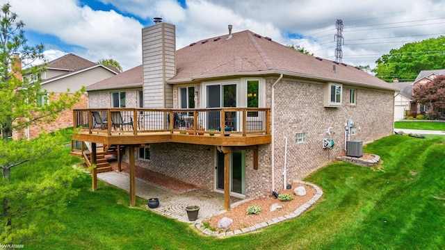 518 Lexington Dr, Rochester Hills, MI 48307 - rear view of property with brick siding, a wooden deck, a chimney, a lawn, and a patio