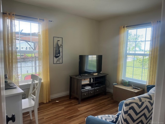727 Townsend Dr, Algonac, MI 48001 - living area with plenty of natural light, wood finished floors, and baseboards