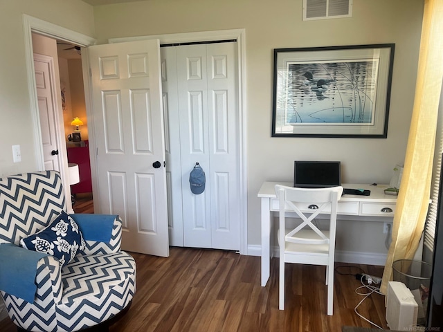 727 Townsend Dr, Algonac, MI 48001 - home office with dark wood finished floors and baseboards