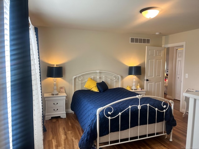 727 Townsend Dr, Algonac, MI 48001 - bedroom with wood finished floors and baseboards