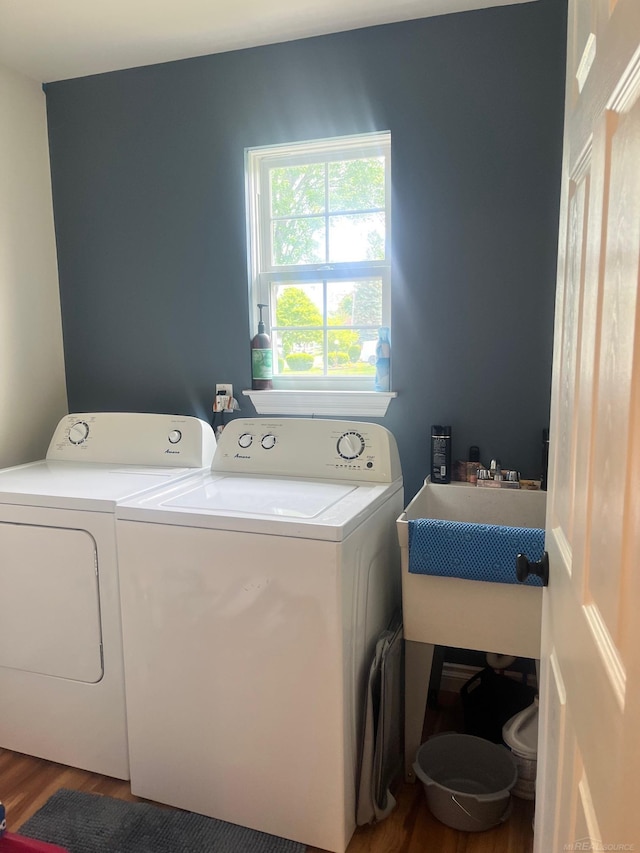 727 Townsend Dr, Algonac, MI 48001 - laundry room featuring washer and clothes dryer and wood finished floors