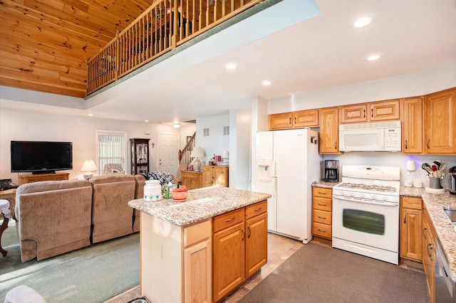 8735 Blackberry Ln, Port Austin, MI 48467 - kitchen with white appliances, recessed lighting, open floor plan, wood ceiling, and a kitchen island