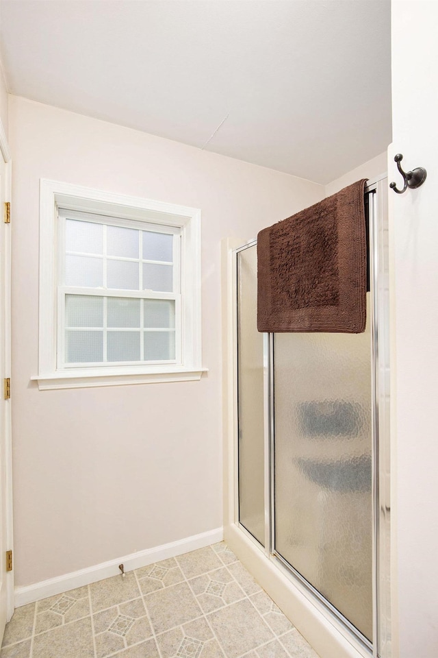 8735 Blackberry Ln, Port Austin, MI 48467 - full bath with baseboards and a stall shower