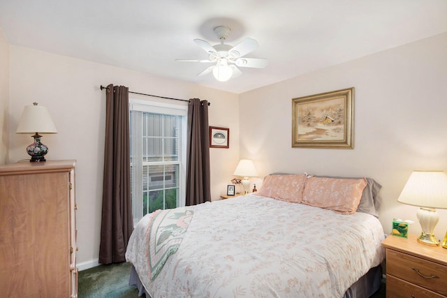 8735 Blackberry Ln, Port Austin, MI 48467 - bedroom with carpet flooring, ceiling fan, and baseboards