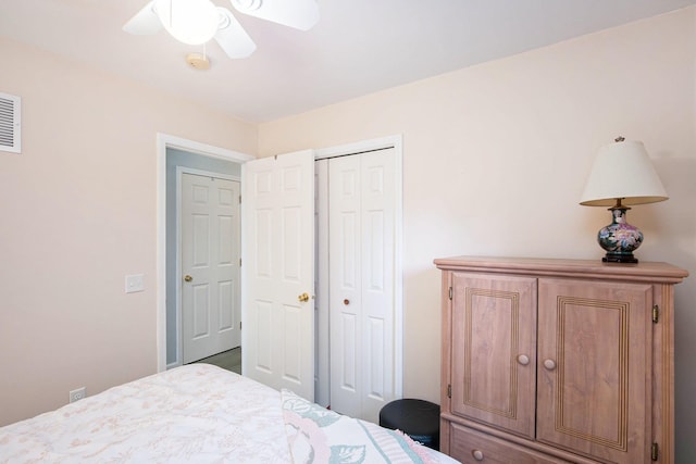 8735 Blackberry Ln, Port Austin, MI 48467 - bedroom featuring a closet and ceiling fan