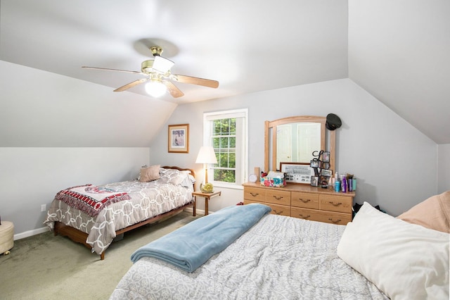 8735 Blackberry Ln, Port Austin, MI 48467 - bedroom featuring vaulted ceiling, carpet, ceiling fan, and baseboards