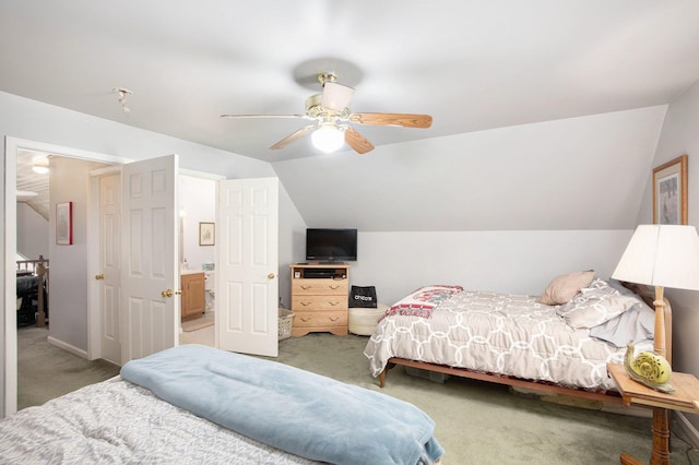 8735 Blackberry Ln, Port Austin, MI 48467 - carpeted bedroom featuring lofted ceiling and a ceiling fan