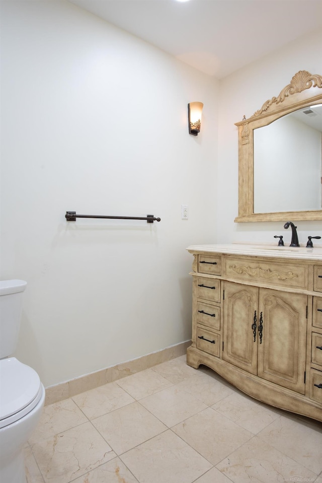5311 Cambourne Pl, West Bloomfield, MI 48322 - bathroom featuring toilet, vanity, and baseboards