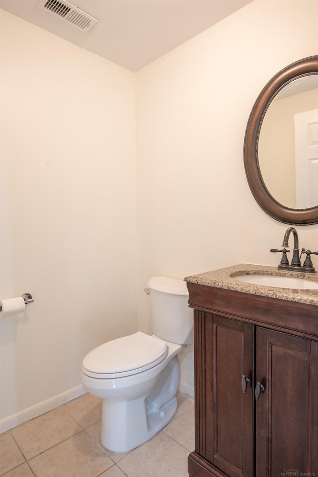 5311 Cambourne Pl, West Bloomfield, MI 48322 - half bath featuring toilet, tile patterned flooring, vanity, and baseboards