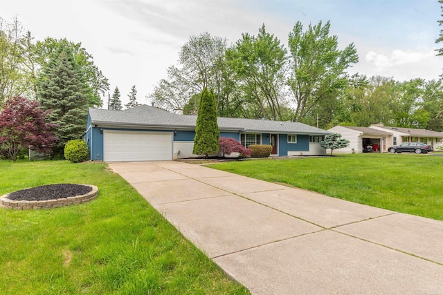 5311 Cambourne Pl, West Bloomfield, MI 48322 - view of front of home with a garage, concrete driveway, and a front yard