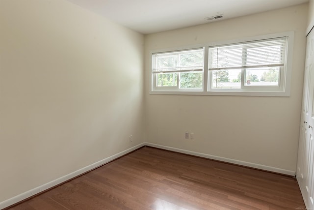 5311 Cambourne Pl, West Bloomfield, MI 48322 - empty room with wood finished floors and baseboards