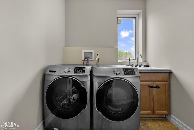 26898 Alderman Ct, Harrison Twp, MI 48045 - washroom with washer and clothes dryer, cabinet space, and baseboards