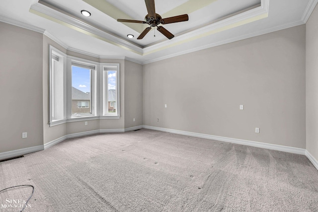 26898 Alderman Ct, Harrison Twp, MI 48045 - carpeted empty room featuring a tray ceiling, ornamental molding, ceiling fan, baseboards, and recessed lighting