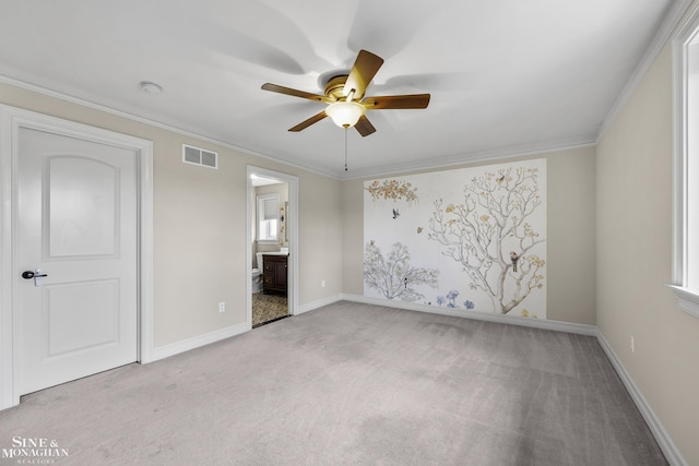 26898 Alderman Ct, Harrison Twp, MI 48045 - unfurnished bedroom featuring carpet flooring, baseboards, crown molding, ensuite bath, and ceiling fan