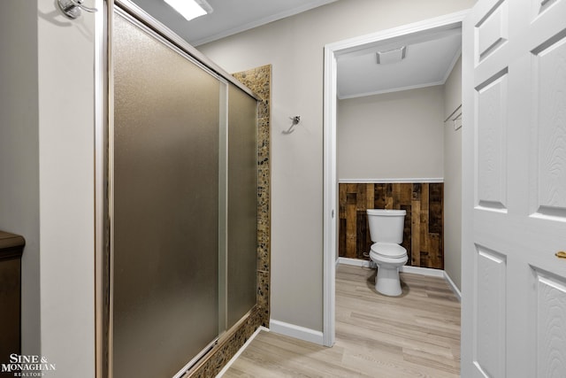 26898 Alderman Ct, Harrison Twp, MI 48045 - bathroom with toilet, wood finished floors, crown molding, a shower stall, and baseboards
