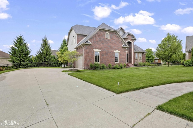 26898 Alderman Ct, Harrison Twp, MI 48045 - view of side of home with brick siding and driveway