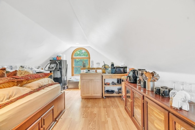 7696 Varty Ct, Lexington, MI 48450 - bedroom featuring light wood-style flooring and lofted ceiling