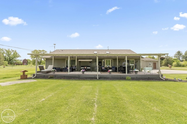 7360 Frith Rd, Saint Clair, MI 48079 - back of property featuring a patio area, a yard, and outdoor lounge area
