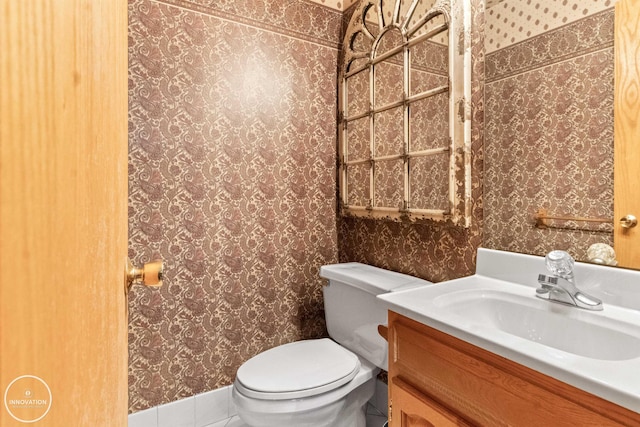 7360 Frith Rd, Saint Clair, MI 48079 - bathroom featuring vanity, toilet, and tile patterned flooring