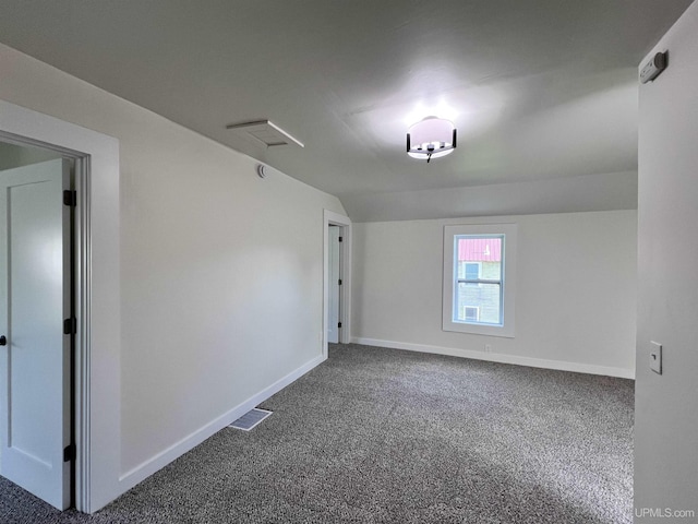 1607 Davidson St, Iron River, MI 49935 - unfurnished room featuring dark carpet and baseboards